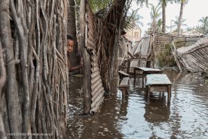 Child in the middle of the water left by Cyclone Freddy Madagascar.